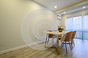 Large beige and cream luxury kitchen interior with empty wall