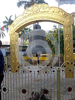 Large bell at buddhist  spritual place in varanasi india photo