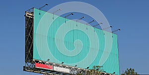 Large billboard soars into blue sky