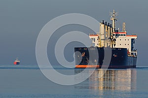 A LARGE BLACK BULK CARRIER