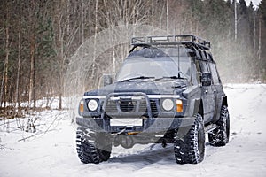 A large black expeditionary SUV photo