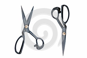 Large black scissors, two pairs, one opened, one closed, isolated on white background