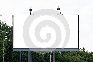 The large blank billboard with the sky, ready to use for new mockup advertisement, marketing street media and backgroud concept