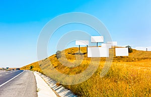 Large blank billboards for outdoor advertising on highway