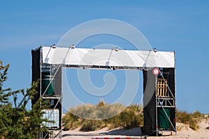 Large blank white banner over entrance to a beach