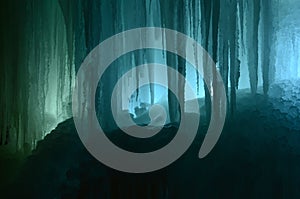 Large blocks of ice frozen waterfall or cavern background
