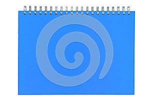 Large blue notebook on a spring
