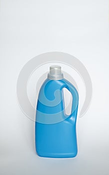 Large blue plastic bottle with gel for washing isolated on a white background. Laundry container, merchandise template.