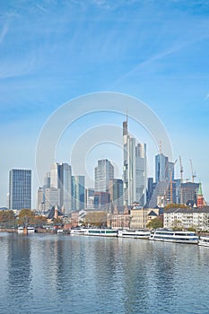 the large body of water in front of a city with high rise buildings