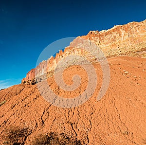 Large Boulder Below the Steep Cliffs of the Waterpocket Fold