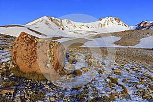 A large boulder in defocus on the way to the top of Mount Erciyes in central Anatolia, Turkey