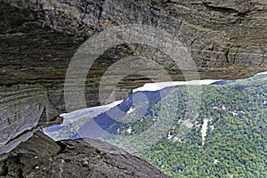 Large boulders frame a mountain scene on Chimney Rock Park.