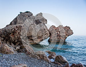 Large boulders near the cliff by the sea