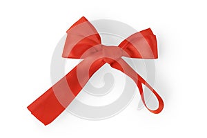 Large bow on a wide red satin ribbon isolated with clipping path