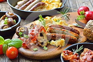 Large breakfast with eggs and sausages