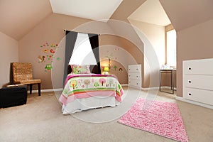 Large brown baby girl bedroom with pink.