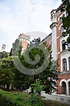 Large building with battlements, headquarters of the local police, near the attaule palace museum of the famous father of spicoana