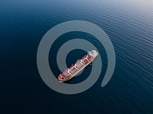 Large bulk carrier cargo ship Floating on Vast Water