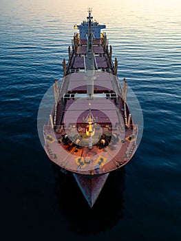 Large bulk carrier cargo ship Floating on Vast Water