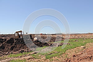 Large bulldozer at work at a construction site