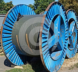 Large cable reels on the street