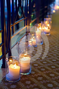 Large candles in glass