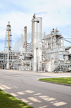 Large-capacity ammonia production workshop. Exterior of modern petrochemical plant with reactors and converters under