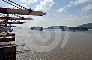 Large cargo container ships in the port of Yangshan.