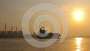 Large Cargo Shipping Boat at sunrising