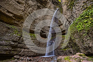 Large cascade of the Adai-Su mountain waterfall