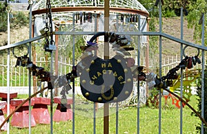 A large castle weighs on an iron fence