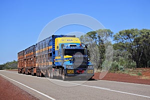 Large cattle trailer road train on outback road in North Territory Australia