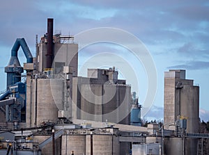 Large cement factory by the beautiful sea