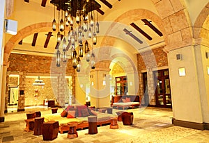 The large chandelier at lobby in luxury hotel