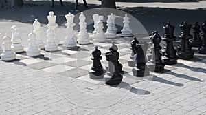 A large chess playground in the parkis reday for playing