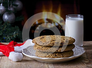 Large choc chip cookies with glass of milk