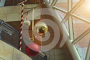 Large Christmas tree balls hanging at the mall. Toning