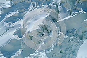 A large chunk of ice has broken off from a glacier