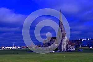 A Large church standing in the middle of a park