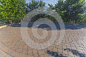 Large circular driveway area with brick stone