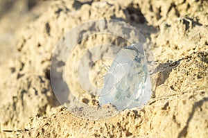 Large clear pure transparent great royal crystal of quartz chalcedony diamond brilliant on nature blurred bokeh