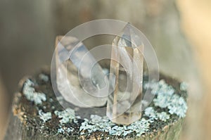 Large clear pure transparent great royal crystal of quartz chalcedony diamond brilliant on nature blurred bokeh background closeup