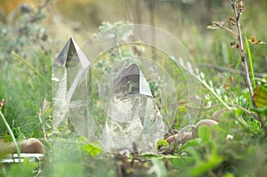 Large clear pure transparent great royal crystals of quartz chalcedony diamond brilliant on nature blurred bokeh autumn background