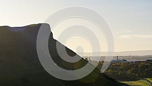 A large cliff with morning sky