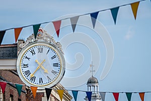 Large clock against blue sky