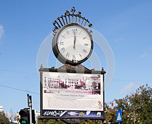 Large clock with arrows on the Revolution Square in Capital city of Romania - Bucharest