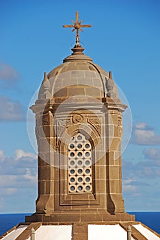 Large closeup tower rooftop dome of Las Palmas de Gran Canaria Cathedral overlooking Atlantic ocean, Canary Islands, Spain