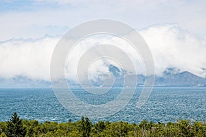 large cloud over coast of Lake Sevan, Armenia