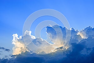 Large clouds on a background of blue sky