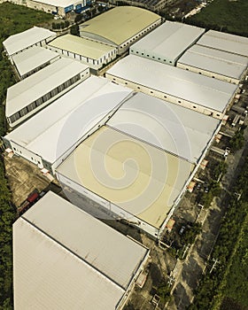 A large cluster of expansive warehouses on former farmland property. Industrial zone in Santo Tomas, Batangas